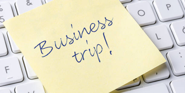 istock Sticky note on a keyboard - Business trip 1796341752