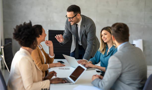 istock Successful business professionals presenting analytical report, working together in corporate office 1796349978