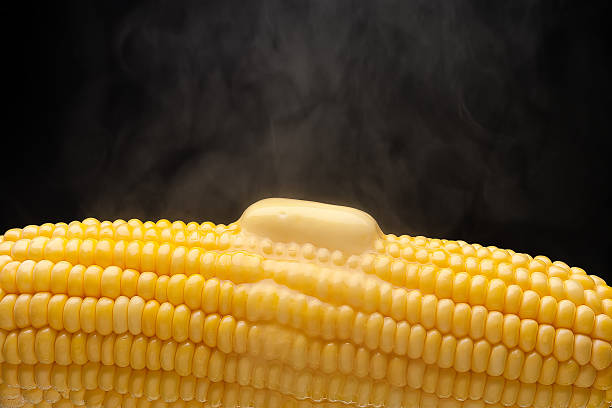 istock Hot corn with steam and melting butter closeup 179636787