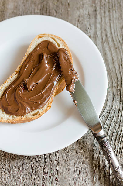 istock Slice of bread with chocolate cream 179637008