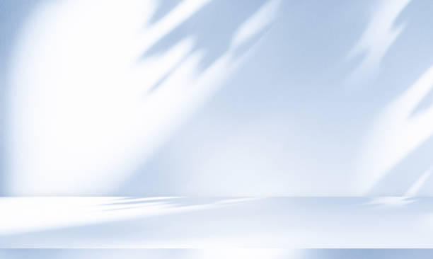 istock Wall interior background, studio  and backdrops show products.with shadow from window color white and blue light. background for text insertion and presentation product 1796370411