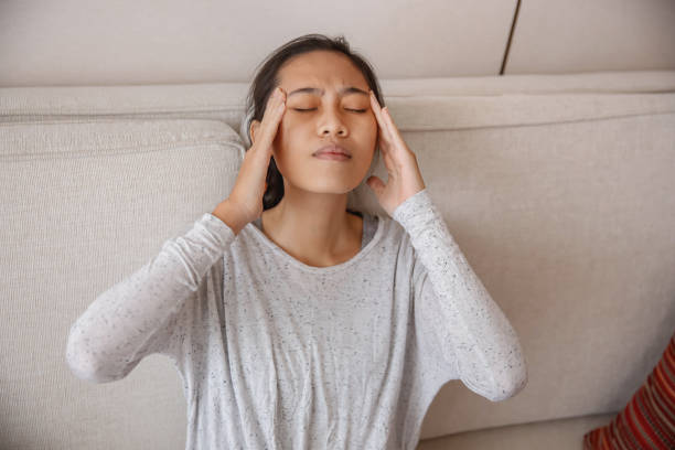istock Young Asian Woman Suffering Headache 1796370442