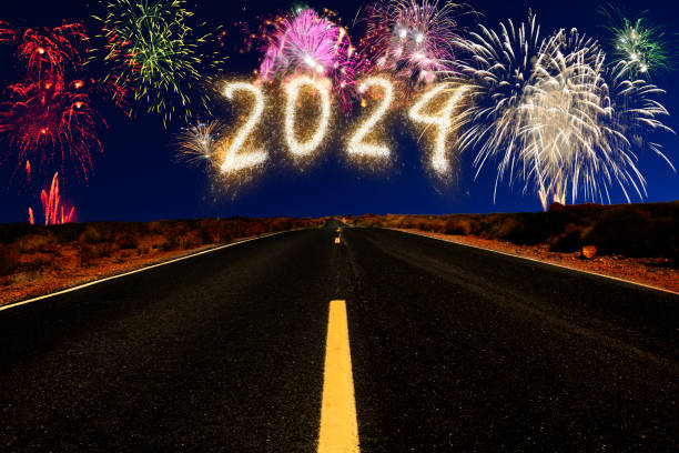 istock New year 2024  fireworks over country road 1796390921