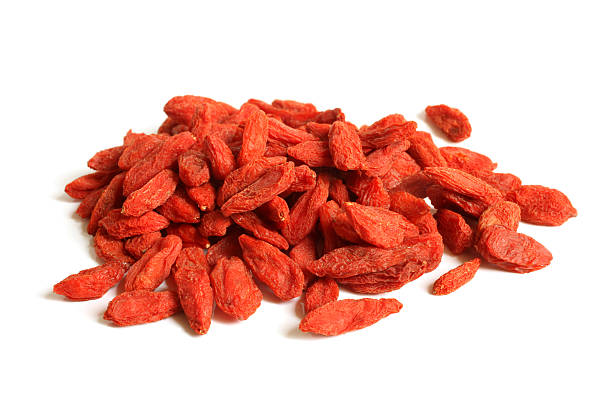 Red dried goji berries (Lycium Barbarum - Wolfberry) Red dried goji berries (Lycium Barbarum - Wolfberry) on a white background. wolfberry stock pictures, royalty-free photos & images