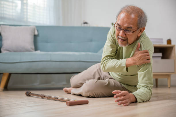 istock Older senior man headache lying on the floor after falling 1796419301