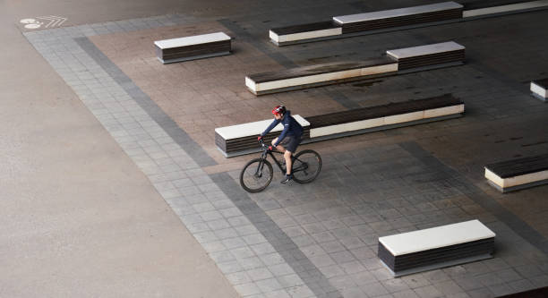 istock Man riding on bicycle in the city. View from above. 1796425771