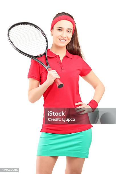 Photo libre de droit de Jeune Femme Tenant Une Raquette De Tennis banque d'images et plus d'images libres de droit de Adulte - Adulte, Beauté, Belle femme