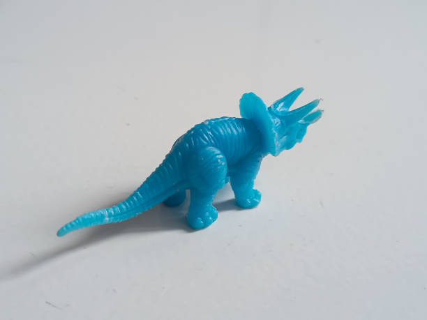 istock Toy dinosaur on white background 1796448536