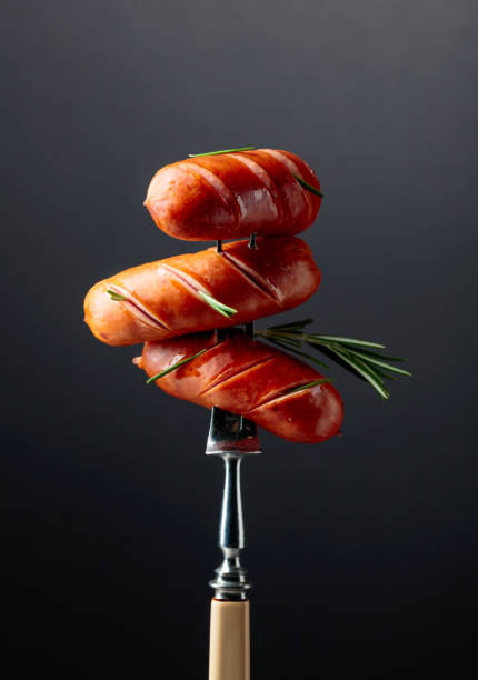 istock Grilled sausages with rosemary. 1796457091