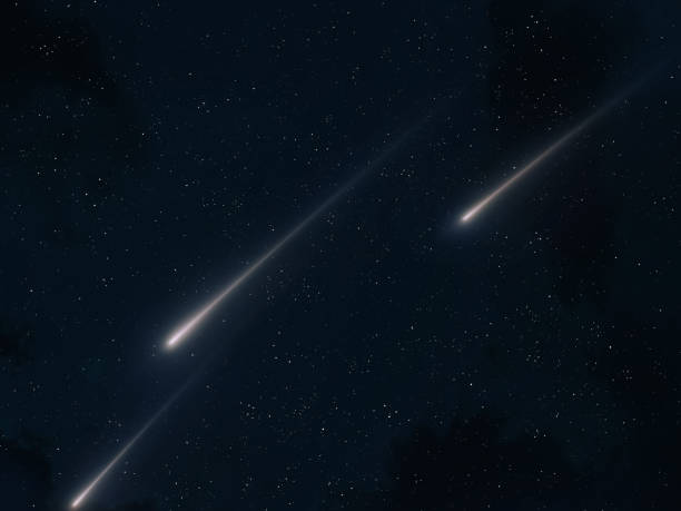 istock Meteor trails in the night sky, beautiful meteor shower. falling stars. 1796469512