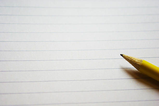 istock Blank paper with pencil on wood table 179648125
