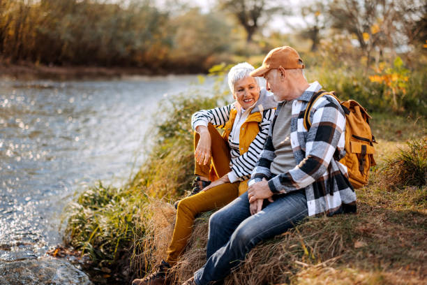 istock Senior couple enjoying sunny day by the river 1796489452