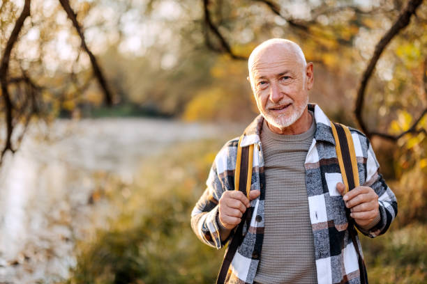 Senior male hiker posing for a shot
