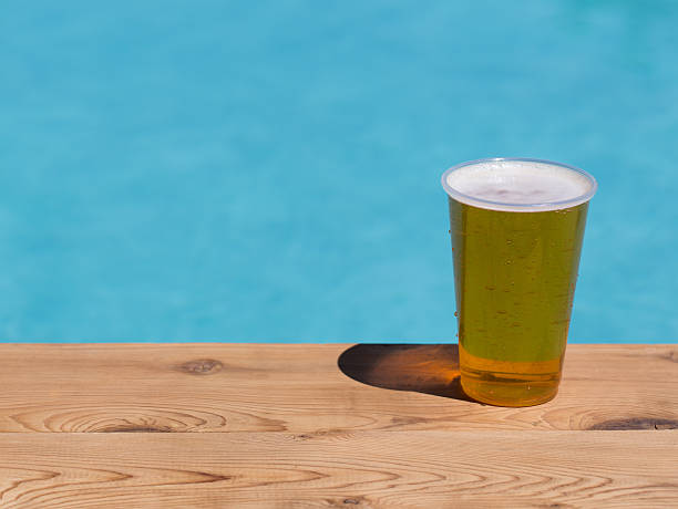 istock Golden lager or beer in disposable plastic cup 179650728