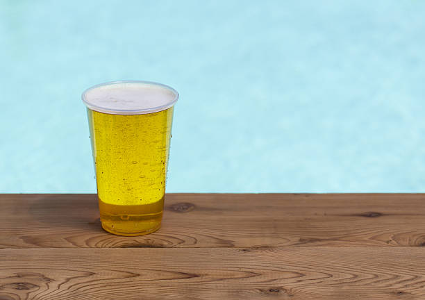 istock Golden lager or beer in disposable plastic cup 179650729