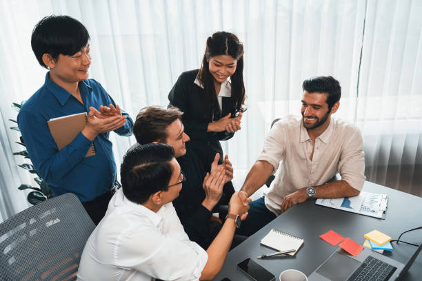 istock Group of diverse office worker employee shake hand and working together. Prudent 1796508070