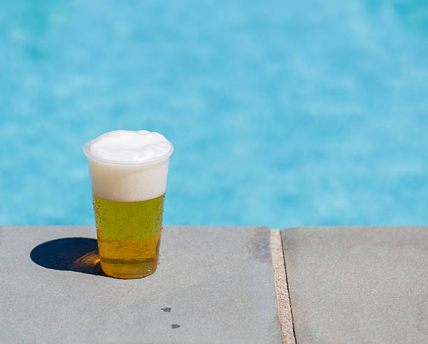 istock Golden lager or beer in disposable plastic cup 179651128