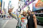 Gay New Yorkers walking in Times Square