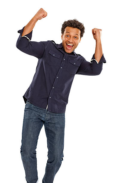 istock Mature african man with his arms raised looking excited 179652849