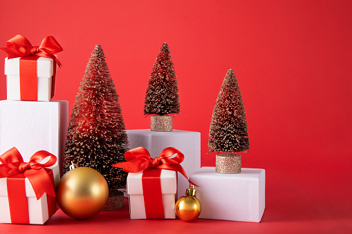 Christmas background with Christmas gifts, trees and ornaments