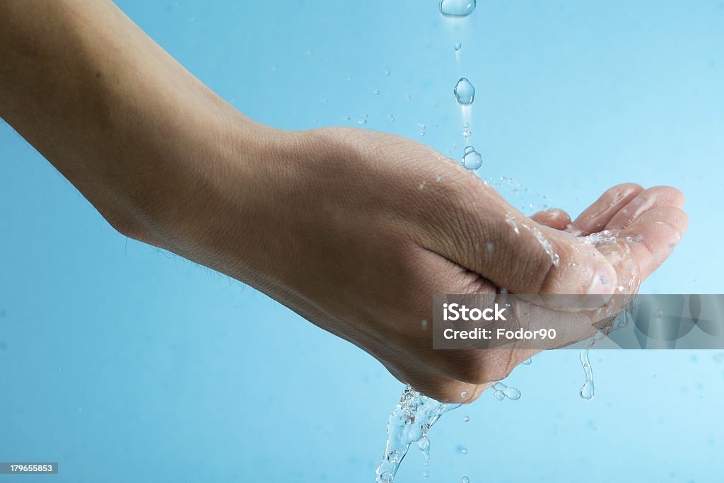 Mano e acqua - Foto stock royalty-free di Acqua