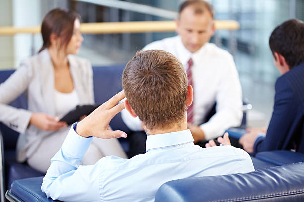 istock Catching a glimpse of business discussion 179656659