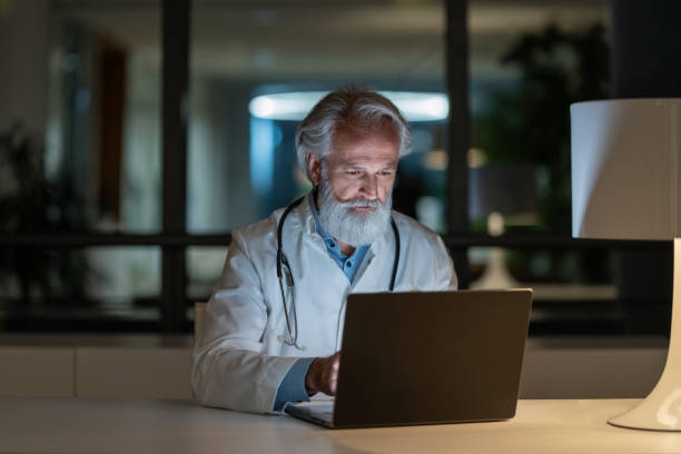 istock Doctor behind the laptop 1796596787