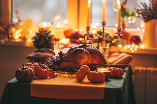 istock Thanksgiving holiday dinner table setting with fall decoration and pumpkins 1796604677