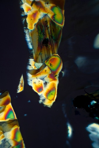 Substance Potassium Ferro cyanide by a microscope in polarized light