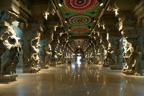 Inside of Meenakshi hindu temple in Madurai, Tamil Nadu, India Inside of Meenakshi hindu temple in Madurai, Tamil Nadu, South India. Religious hall of thousands of columns menakshi stock pictures, royalty-free photos & images