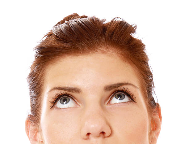 istock Woman looking up at copyspace 179661452