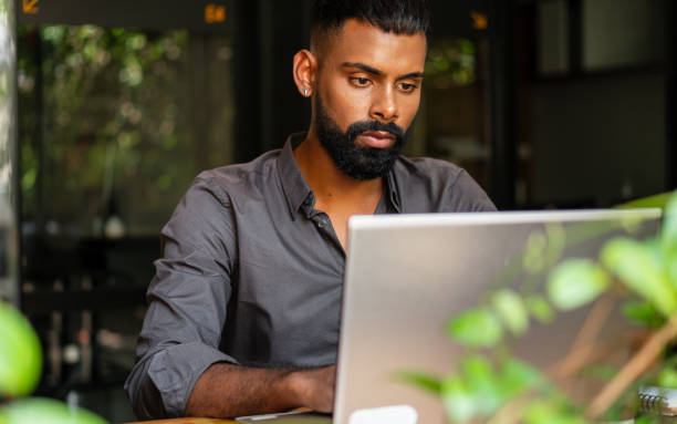 istock man reading report, strategies and working 1796616867