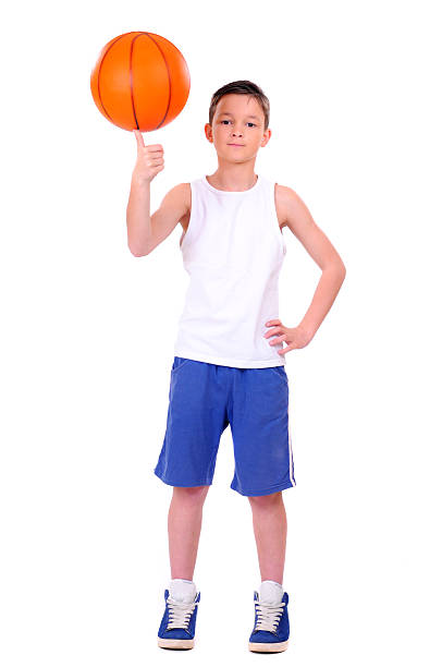 child with basketball, isolated on white background