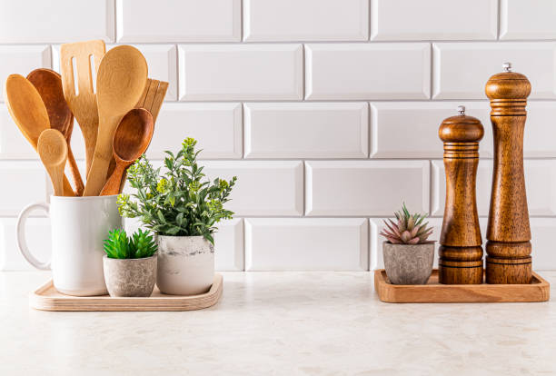 istock Chic kitchen background of modern kitchen space with stylish kitchen utensils. foreground. A copy of the space. Eco style. 1796619965