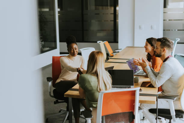istock Young multiethnic startup team working in the modern office 1796630849