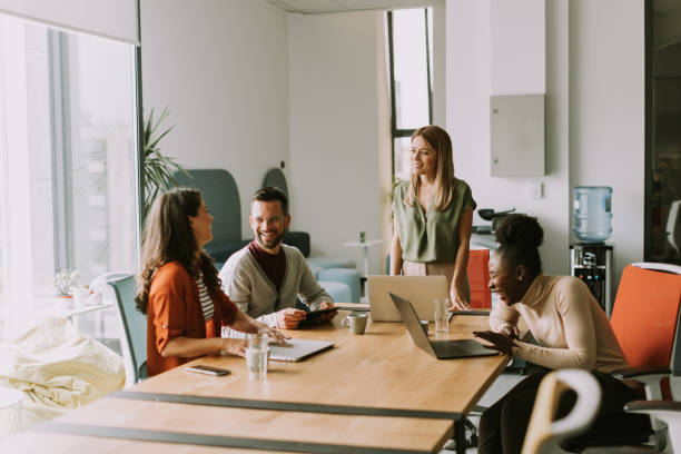 istock Young multiethnic startup team working in the modern office 1796630851