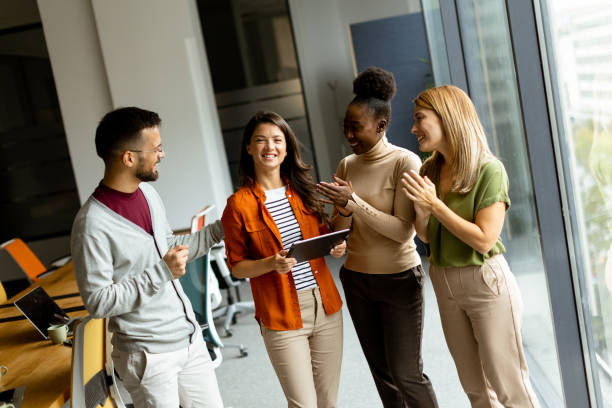 istock Young multiethnic startup team working in the modern office 1796630867