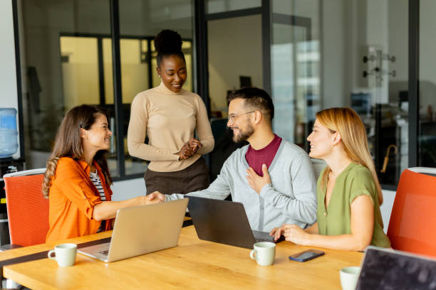 istock Young multiethnic startup team working in the modern office 1796631972