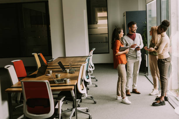 istock Young multiethnic startup team working in the modern office 1796631973