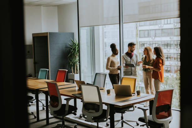 istock Young multiethnic startup team working in the modern office 1796631978