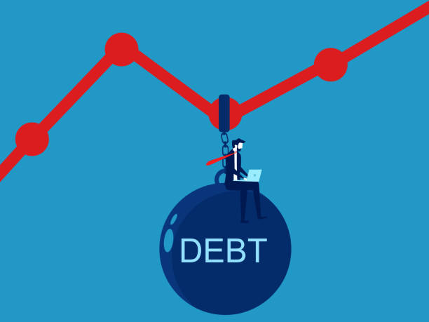 istock Reduce debt to create profits. Businessman uses laptop to analyze debt chart 1796632518