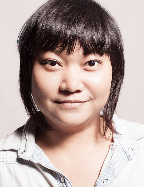 istock Smiling happy asian woman 179664358