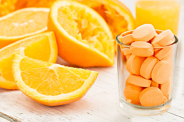 три способа получить витамин c - orange fruit large group of objects food стоковые фото и изображения