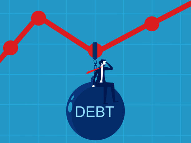 istock Income decreases. Businessman on debt weights on graph 1796646254
