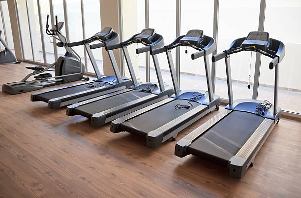 istock Gymnasium with running machines 179666023