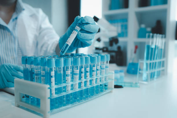 istock Chemist is chemically analyzing test tubes, Scientist is experimenting with chemicals in the laboratory, Chemist is separating compounds in test tubes with chemical reagents, 1796660761
