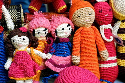 Woolen art in handcraft, Multicolored knitted handmade children toys.