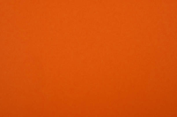 istock Origami, plain background colored paper orange 1796683720