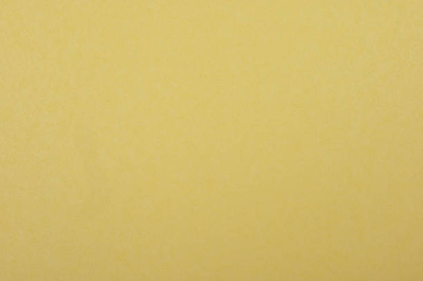 istock Origami, plain background colored paper dull yellow 1796684317