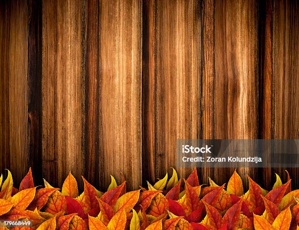 Leaves On Wooden Background Stock Photo - Download Image Now - Autumn, Backgrounds, Brown